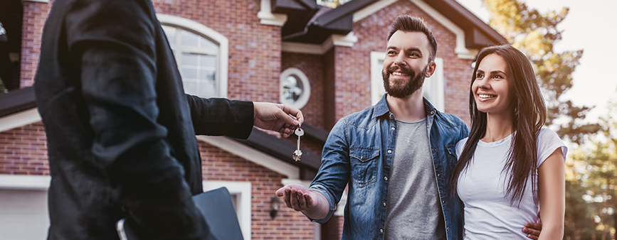 couple securing their first home through mortgage advice